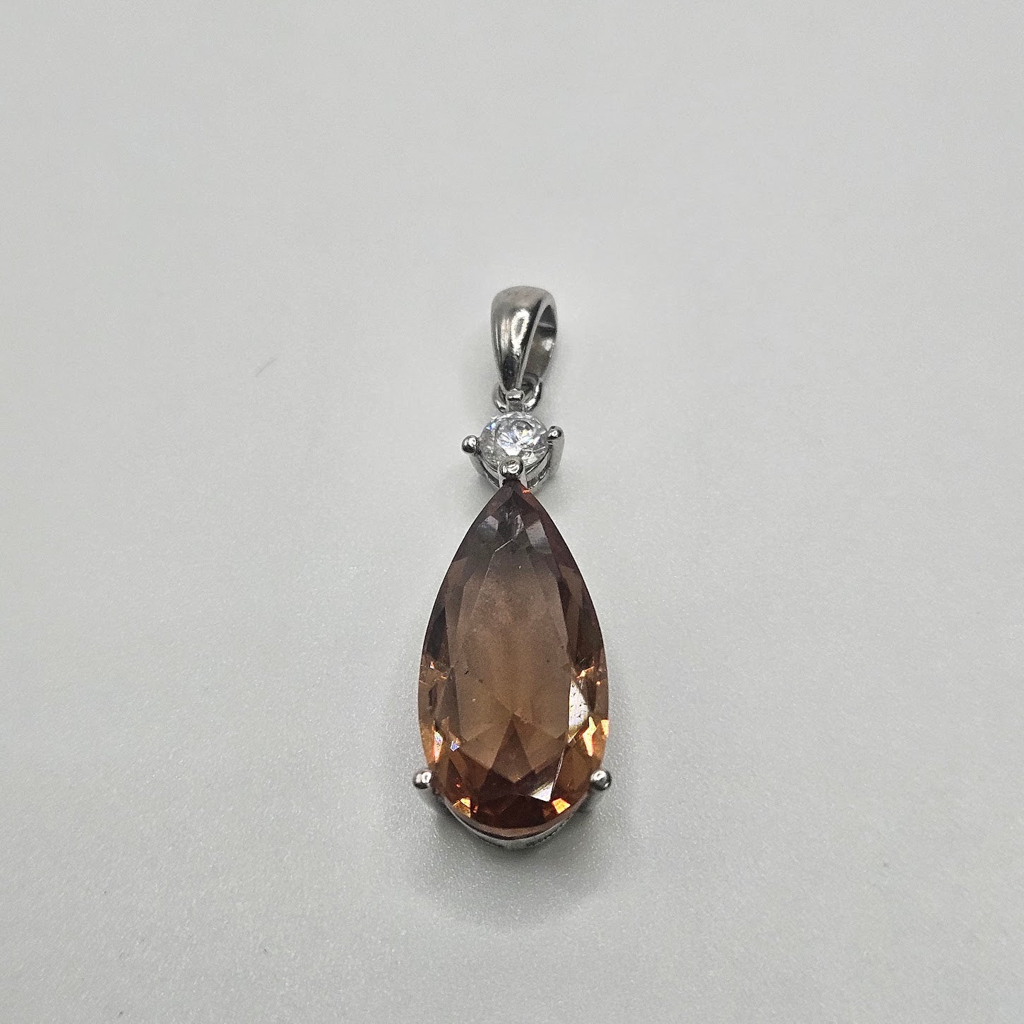 Sterling Silver Lab Grown Alexandrite Teardrop with Diamond Pendant.