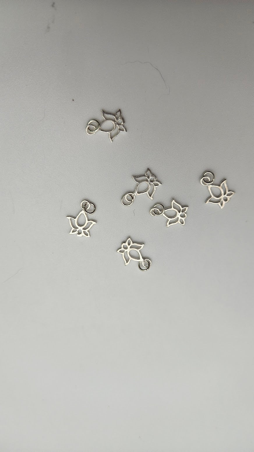 Sterling Silver Lotus Charm Single.