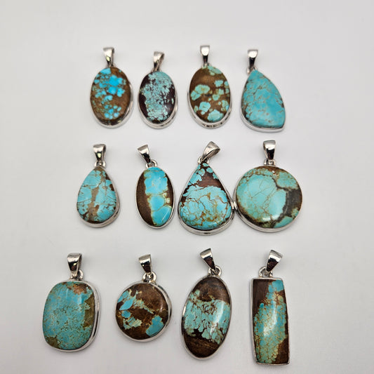 Sterling Silver Number 8 Turquoise Bezel Pendant.