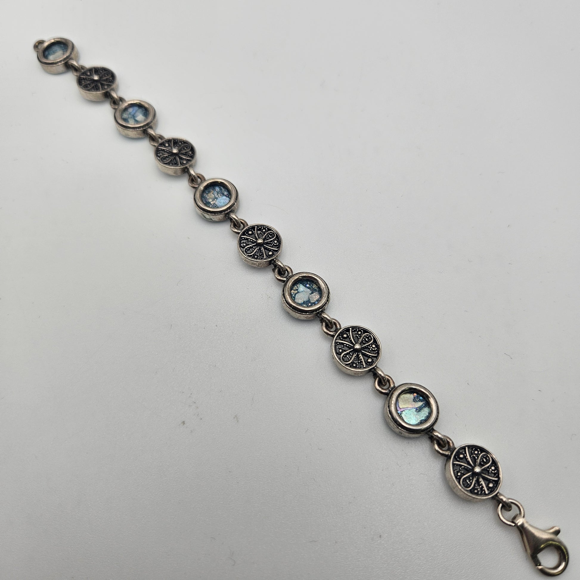 Sterling Silver Roman Glass Small Round Link Bracelet 7 inch.