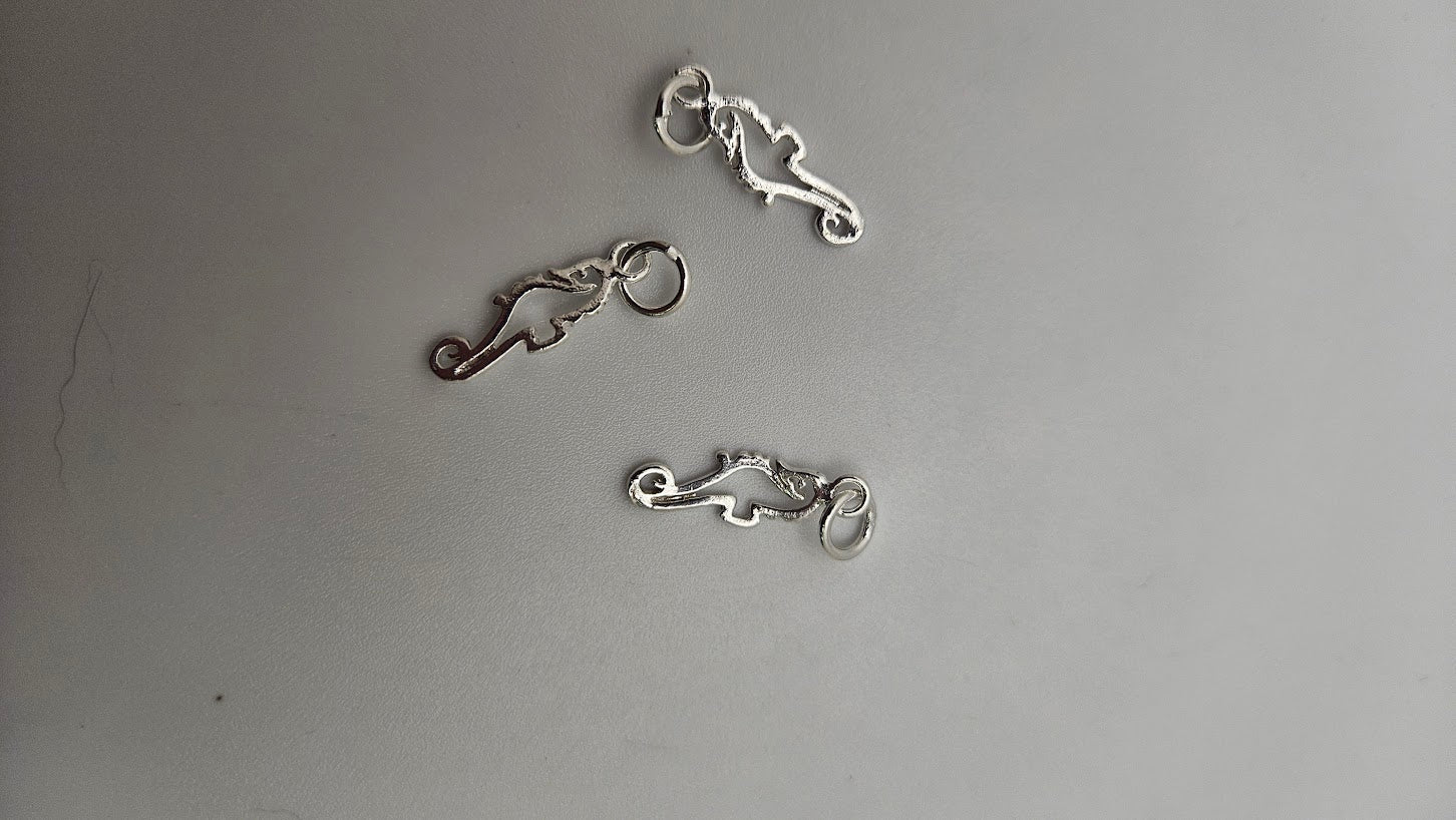 Sterling Silver Seahorse Charm Single.
