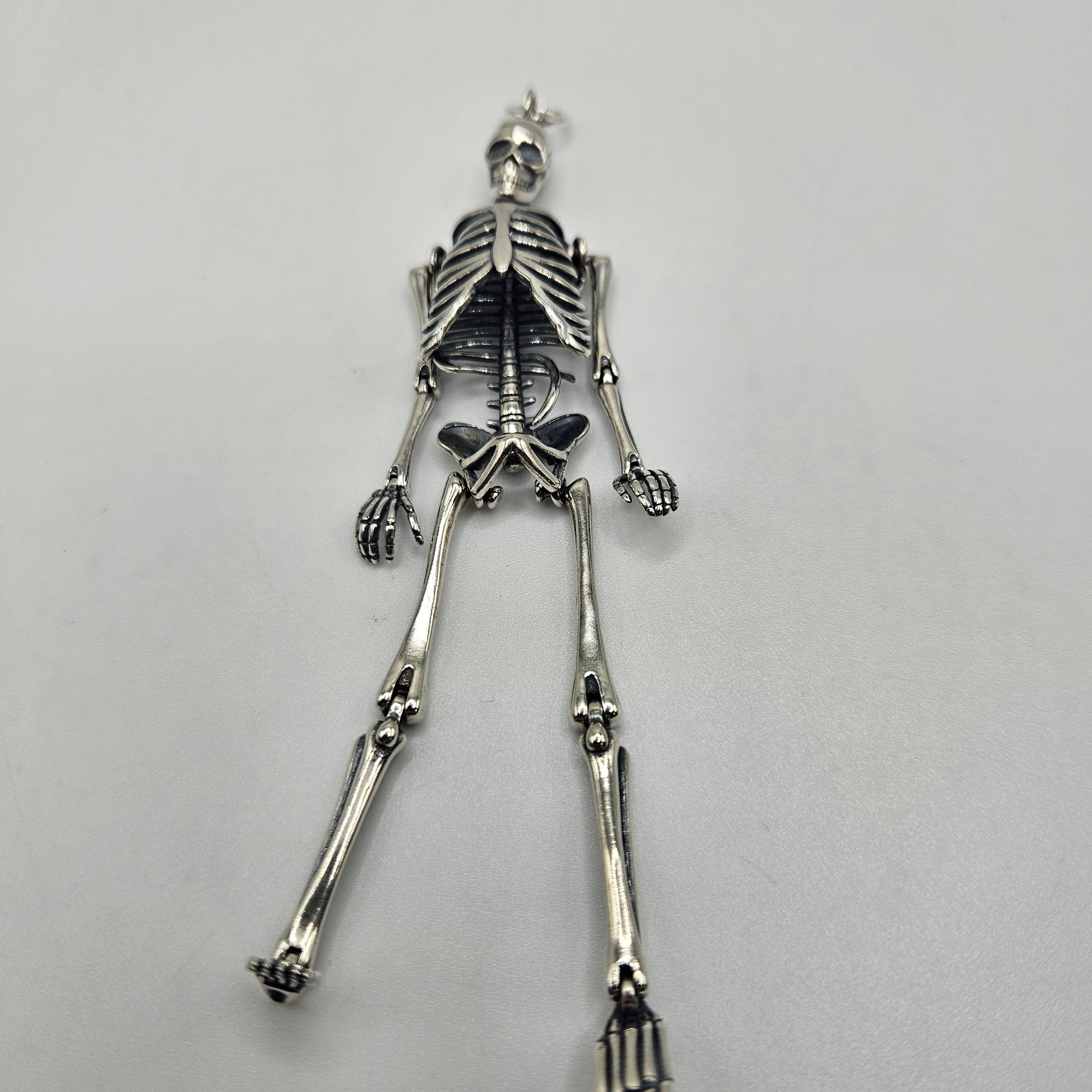 Sterling Silver Skeleton Dangle Pendant.