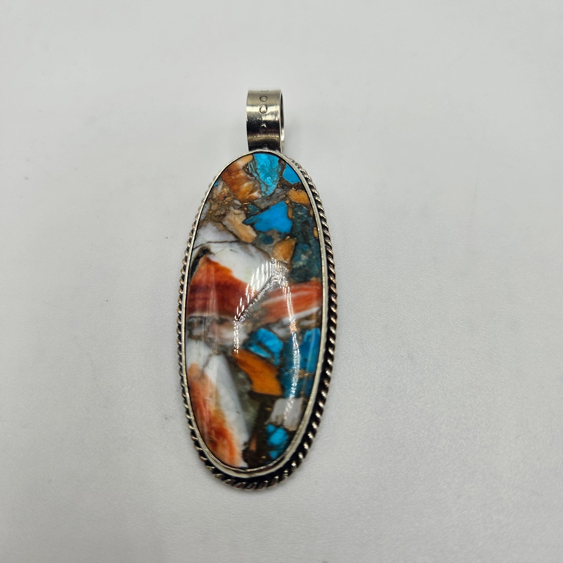 Sterling Silver Spiny Oyster Oval Pendant.