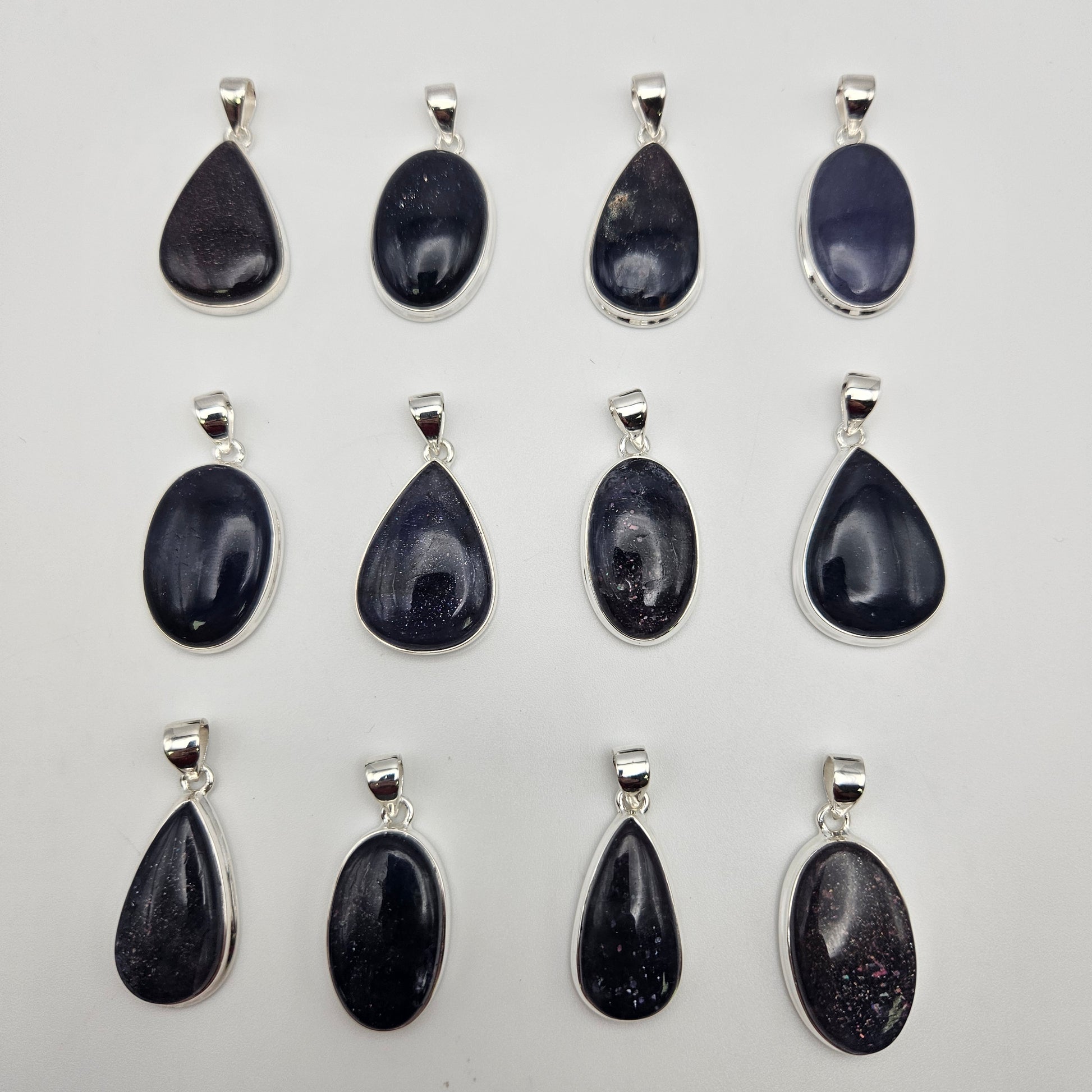 Sterling Silver Sunstone Iolite Bezel Pendant.