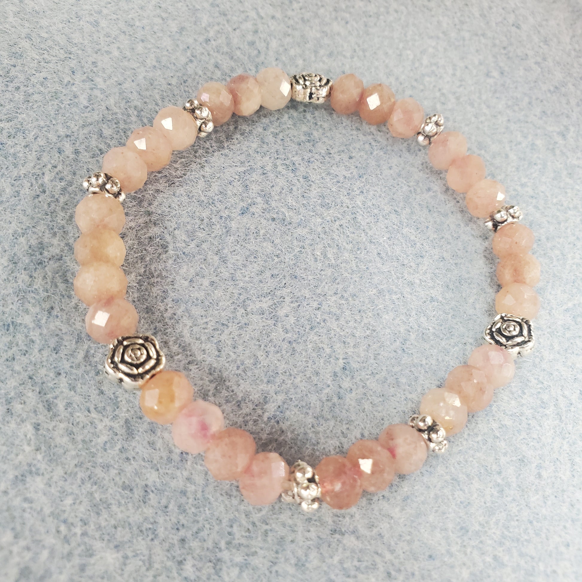 Strawberry Quartz With Pewter Rose Bead Bracelet. 