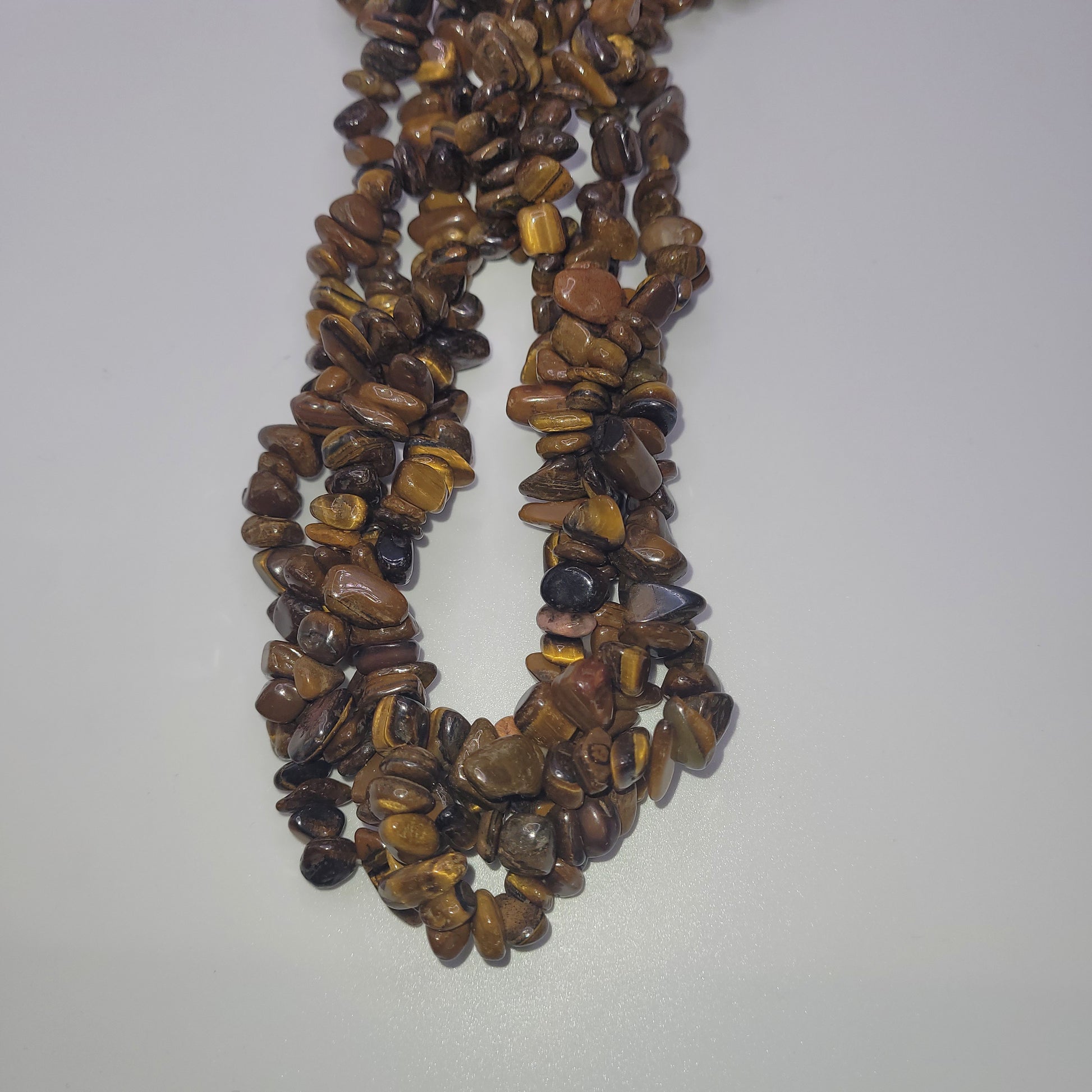 Tiger Eye Chip Bead Strand.