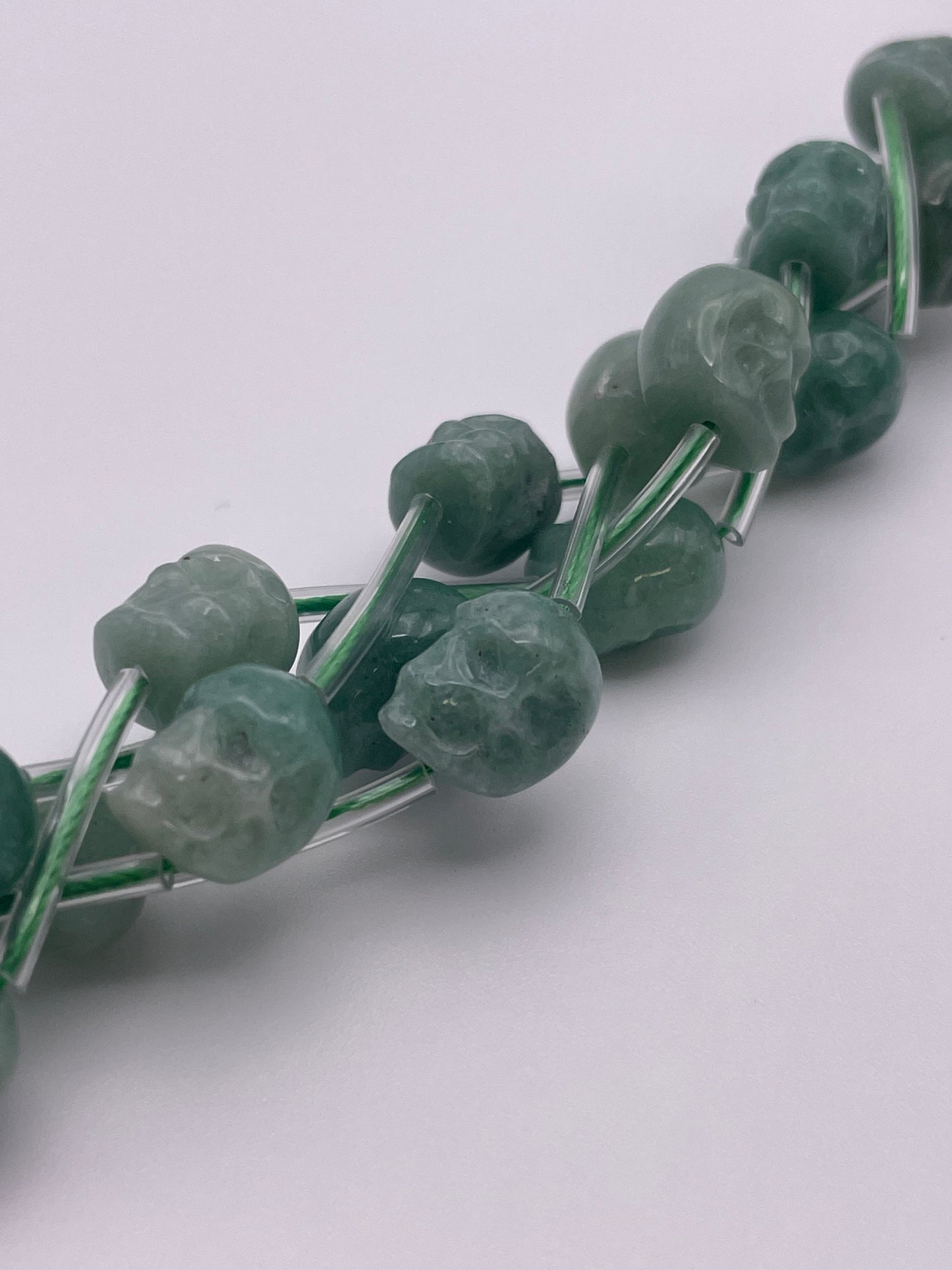 8mm Aventurine Vertical Drilled Skull Bead Strand
