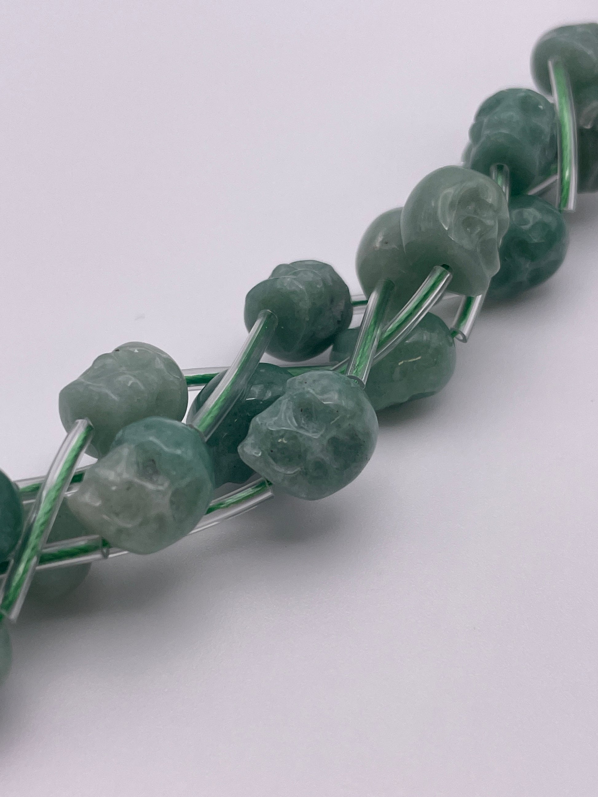 8mm Aventurine Vertical Drilled Skull Bead Strand