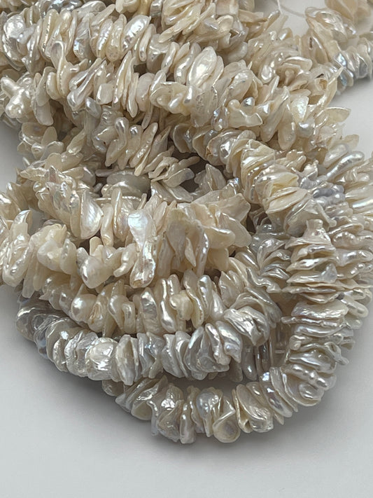 7-9/11-14mm Keshi White Center Drill Pearl