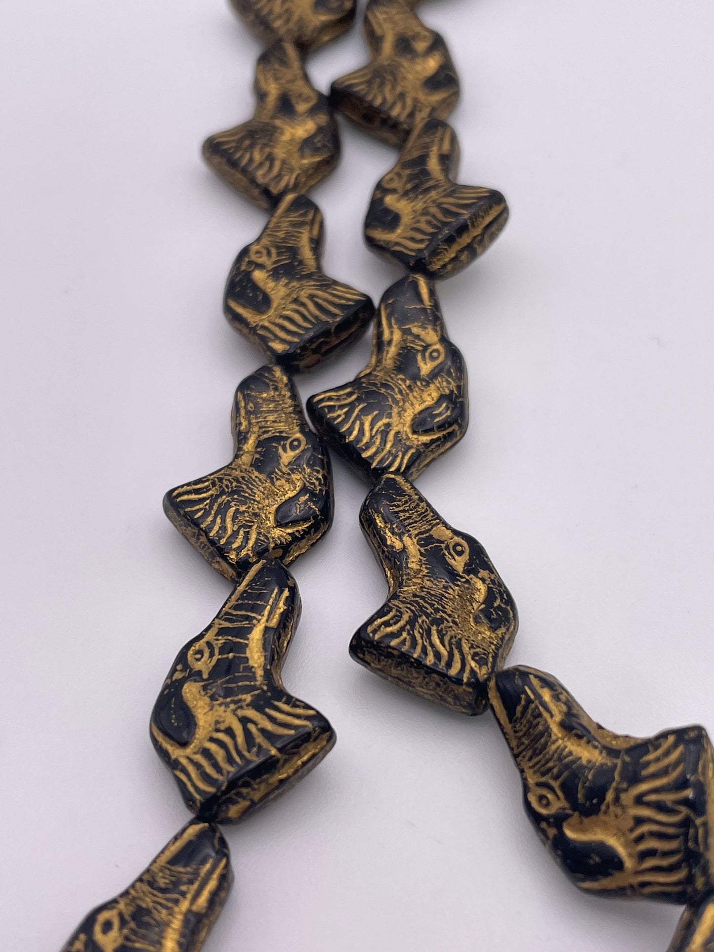 8mm Dog Head Czech Bead Strand