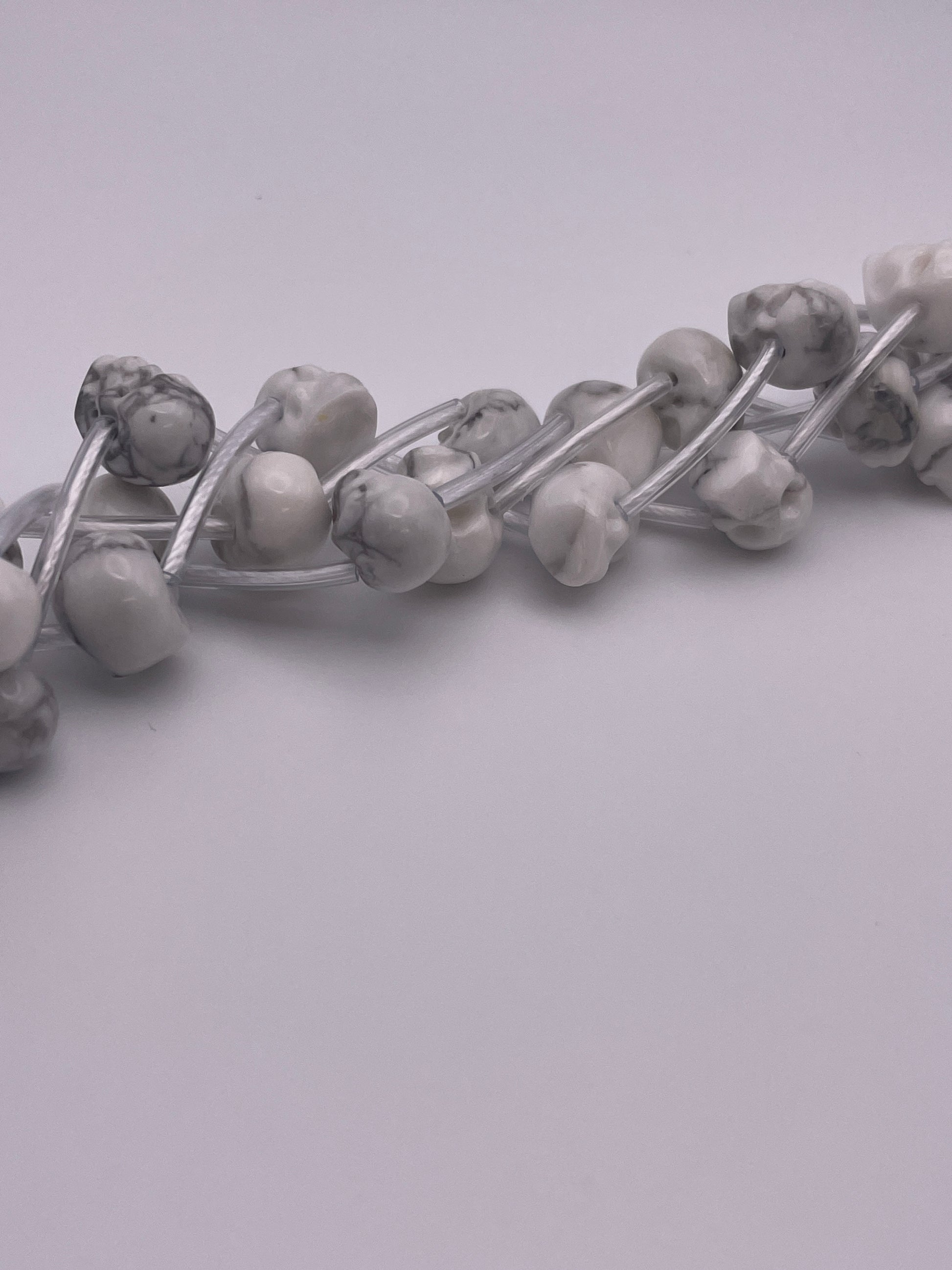 8mm Howlite Horizontal Drilled Skull Bead Strand