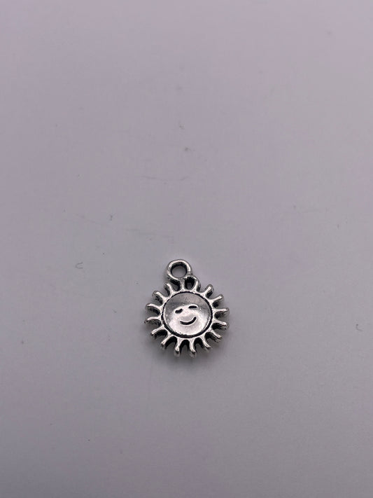 Pewter Smiling Sun Charm 1.30