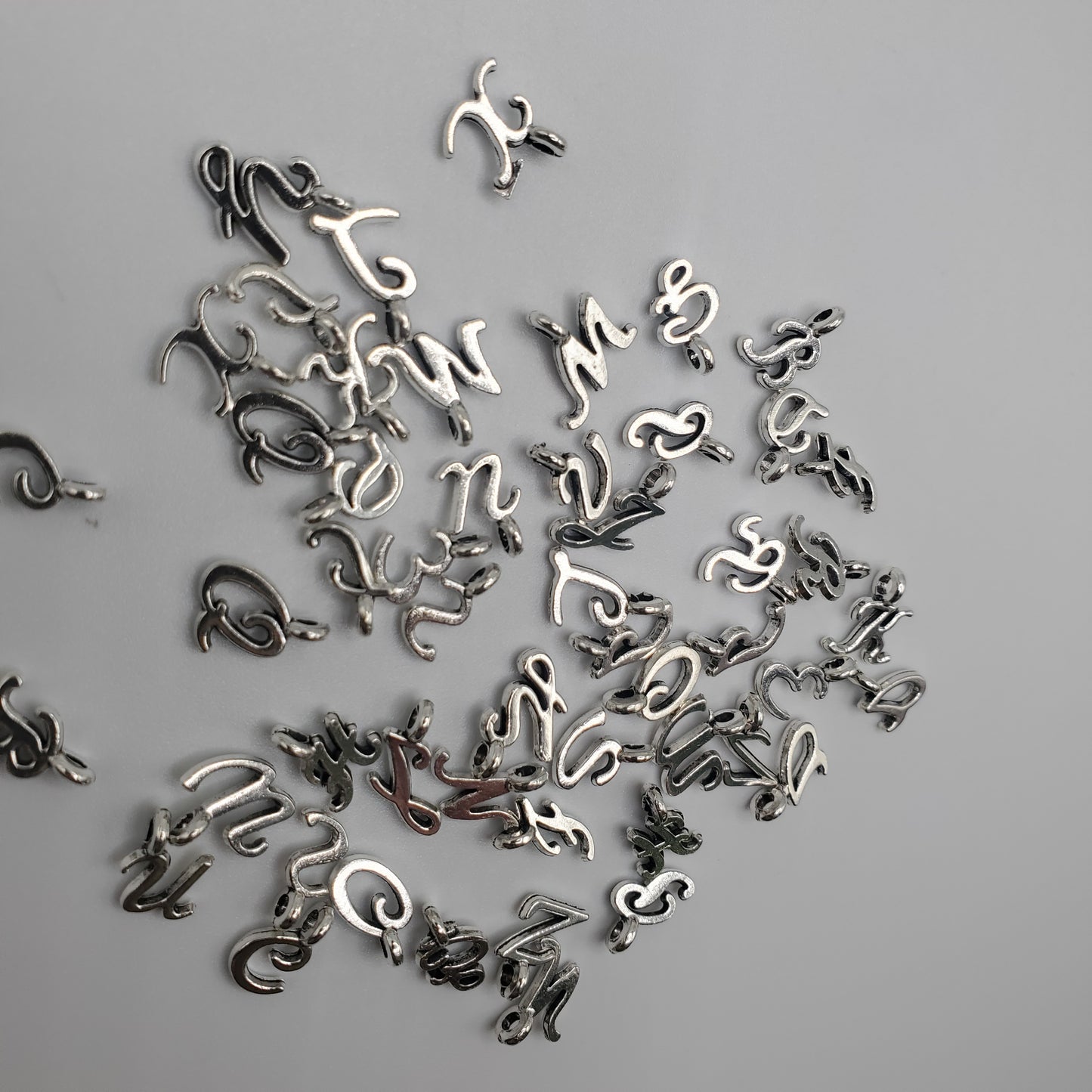 Silver Color Cursive Letter Charm