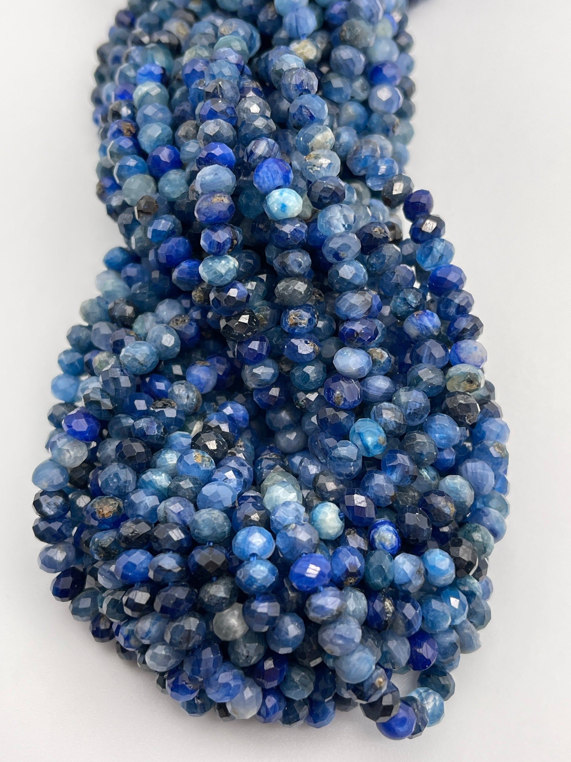 5mm Mixed Blue Gemstone Faceted Rondell Bead strand.