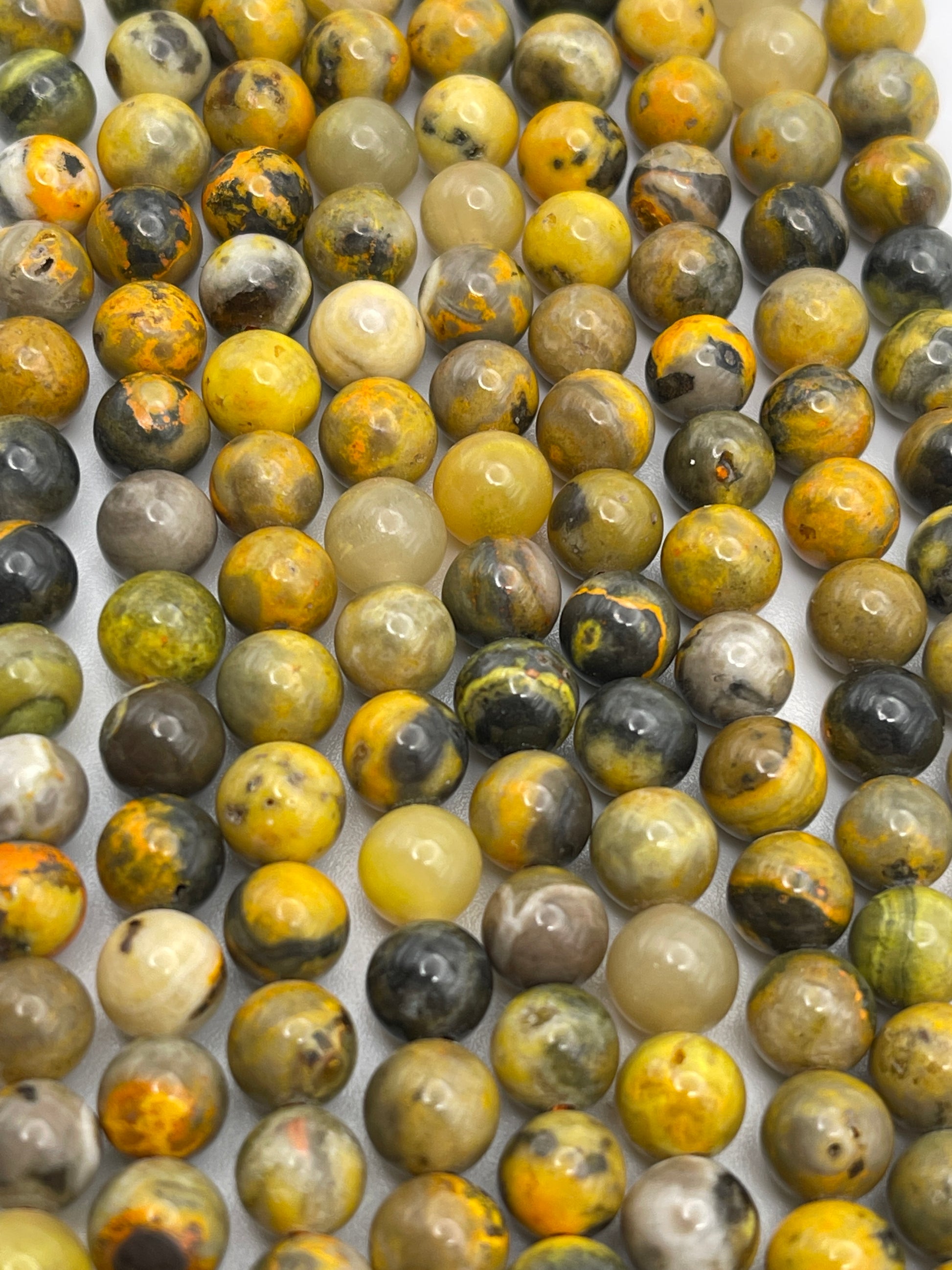 6mm Bumble Bee Jasper Round Smooth Bead Strand.