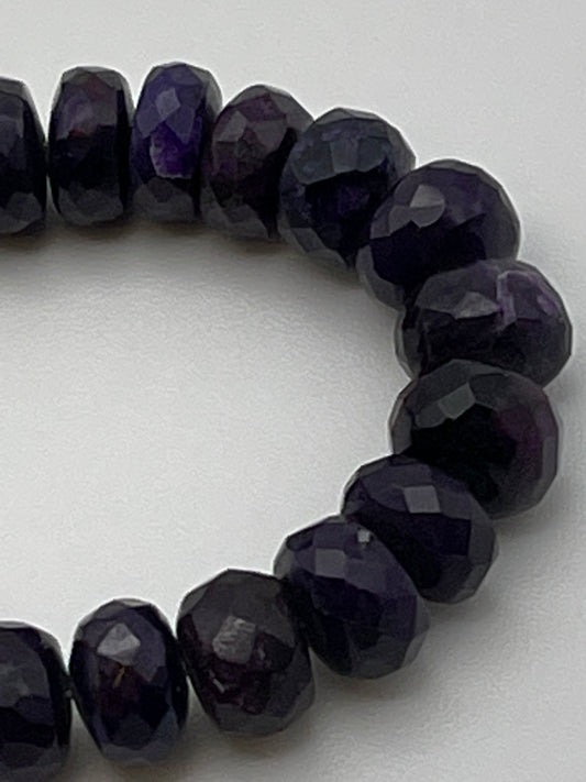7.5mm Faceted Rondelle Sugilite bead strand.