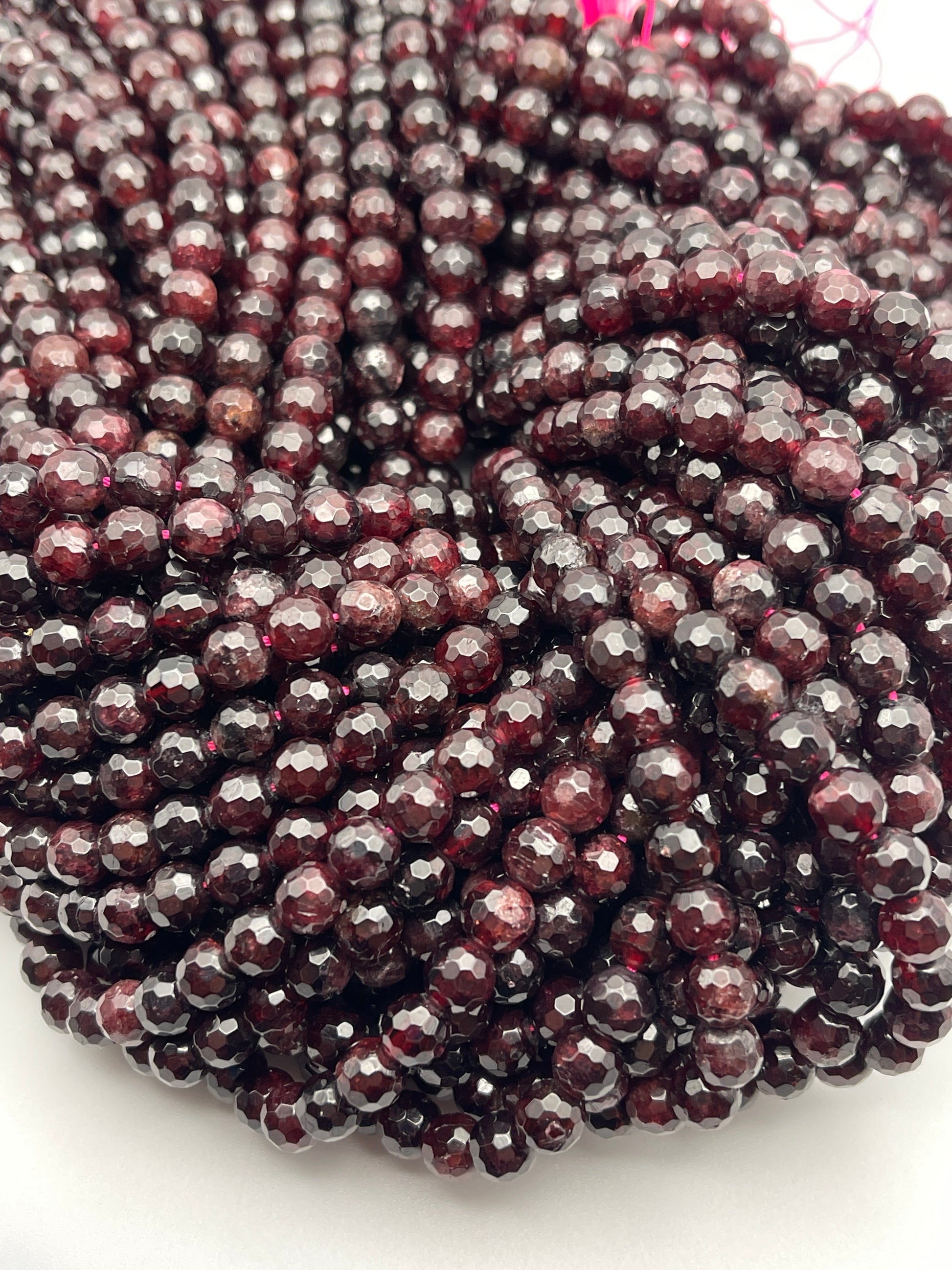 7mm Faceted Garnet Bead Strand.