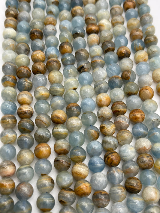8mm Blue Calcite Round Smooth Bead Strand.